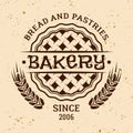 Bakery vintage vector emblem with pie and wheat