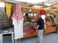 BAKHCHISARAI, CRIMEA. Tourist buys souvenirs on the market