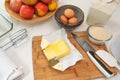 Baking apple pie. Apples, eggs, sugar, butter, flour, and some ingredients close up Royalty Free Stock Photo