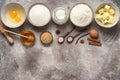 Baking background. Baking ingredients: flour, eggs, sugar, butter, milk and spices. Top view Royalty Free Stock Photo