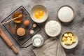 Baking background. Baking ingredients: flour, eggs, sugar, honey, butter, milk and spices on grunge background. Top view Royalty Free Stock Photo