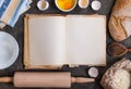 Baking background with blank cook book, flour, rolling pin Royalty Free Stock Photo
