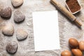 Baking background with blank sheet of paper for the recipe or menu  heart shaped cookies  eggs  flour and rolling pin Royalty Free Stock Photo