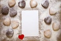 Baking background with blank sheet of paper for the recipe or menu, heart shaped cookies, eggs, flour and small red Royalty Free Stock Photo