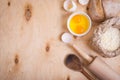 Baking background with bread, eggshell, flour, rolling pin. Close up Royalty Free Stock Photo