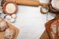 Baking background with cutting board, egg, bread, flour, rolling pin Royalty Free Stock Photo