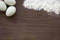 Baking background, eggs and flour on table