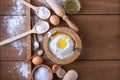 Baking background with flour, eggs and kitchen utensils