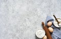 Baking background with flour, wheat ears and rolling pinon concrete background. Top view with copy space Royalty Free Stock Photo