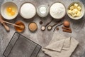 Baking background. Baking ingredients: flour, eggs, sugar, honey, butter, milk and spices on grunge background. Top view Royalty Free Stock Photo