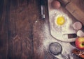 Baking background with raw egg, flour and apple, toning vintage