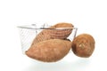 Baking basket with sweet potatoes Royalty Free Stock Photo