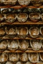 Baking bread. Dough in proofing basket on wooden table with flour, cumin and wheat ears. Top view Royalty Free Stock Photo