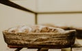 Baking bread. Dough in proofing basket on wooden table with flour, cumin and wheat ears. Top view Royalty Free Stock Photo