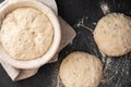 Baking bread. Dough in proofing basket on table with flour, sunflower seeds. Top view. Royalty Free Stock Photo