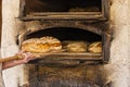 Baking bread in an old time stone woodfired oven