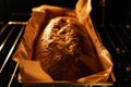 Baking bread in oven Royalty Free Stock Photo