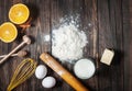 Baking cake in rural kitchen - dough recipe ingredients on vintage wooden table from above