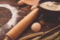 Baking chocolate cake in rural or rustic kitchen. Dough recipe ingredients on vintage wood table Royalty Free Stock Photo