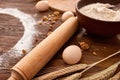 Baking chocolate cake in rural or rustic kitchen. Dough recipe ingredients on vintage wood table Royalty Free Stock Photo