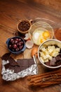 Baking chocolate cake in rural or rustic kitchen. Royalty Free Stock Photo