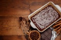 Baking chocolate cake in rural or rustic kitchen. Royalty Free Stock Photo