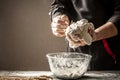 Baking concept. The chef prepares the dough for Italian cuisine Royalty Free Stock Photo