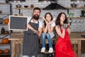 Baking cookies. Culinary school. Mother father and daughter cooking together. Child with parents cooking in kitchen Royalty Free Stock Photo