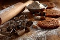 Baking cookies with heart-shaped cutters in a rustic kitchen setting Royalty Free Stock Photo