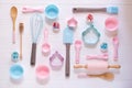 Baking and cooking concept. Pattern made of cookie cutters, whisk, roller pin and kitchen bake tools for making sweets. Royalty Free Stock Photo