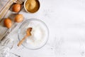 Baking and cooking ingredients on white marble background Royalty Free Stock Photo