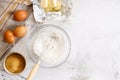 Baking and cooking ingredients on white marble background Royalty Free Stock Photo