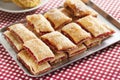 Baking crispy toast with sugar and strawbery jam Royalty Free Stock Photo