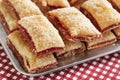 Baking crispy toast with sugar and strawbery jam Royalty Free Stock Photo