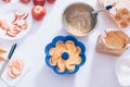 Baking dish filled with batter and fruit slices Royalty Free Stock Photo