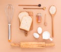 Baking Equipment make Bread wheat grains and cereals on wooden b