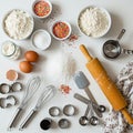 Baking essentials arranged on a white surface include bowls of flour, sugar, and Royalty Free Stock Photo