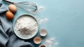 Baking essentials on a blue surface with eggs and flour, AI Generated Royalty Free Stock Photo