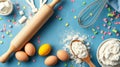 Baking essentials with ingredients and tools on a blue surface for creative cooking activities at home Royalty Free Stock Photo