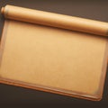Baking essentials Roll of brown parchment paper on dark background Royalty Free Stock Photo
