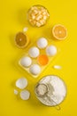 Baking flat lay background with eggs floor butter lemon sieve