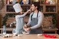 Baking Fun. Happy Little Girl And Her Dad Fooling Together In Kitchen Royalty Free Stock Photo