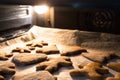 Baking gingerbread cookies for Christmas in the oven