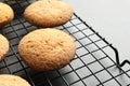 Baking grid with Danish butter cookies on table, closeup Royalty Free Stock Photo