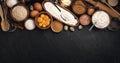 Baking ingredients on black background, top view Royalty Free Stock Photo