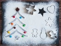 Baking ingredients for Christmas cookies on a dark table, ingredients for baking on dark background, top view