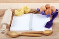 Baking ingredients for cooking and notebook for recipes. Royalty Free Stock Photo