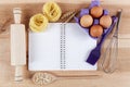 Baking ingredients for cooking and notebook for recipes. Royalty Free Stock Photo