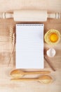 Baking ingredients for cooking and notebook for recipes. Royalty Free Stock Photo