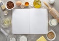 Baking ingredients whit blank of recipe book